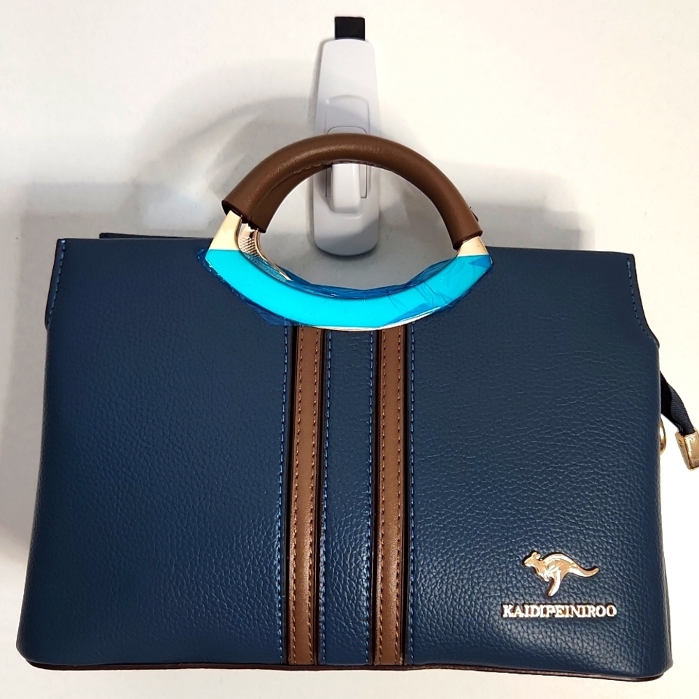 NWT Vegan Blue/Brown Crossbody. So amazingly soft.